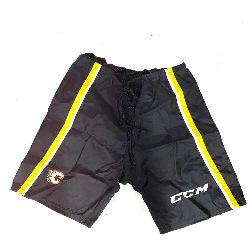 CCM PP10 - New NHL Pro Stock Pant Shell - Calgary Flames (Black/Yellow/White)